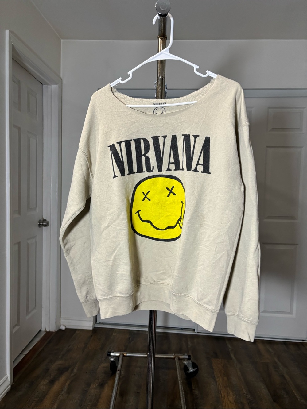 NIRVANA Cream Crewneck Sweatshirt with Yellow Smile Graphic